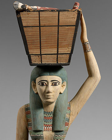Meketre offering bearer with a basket on her head