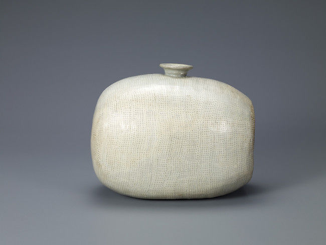 Drum-Shaped Bottle with Decoration of Rows of Dots