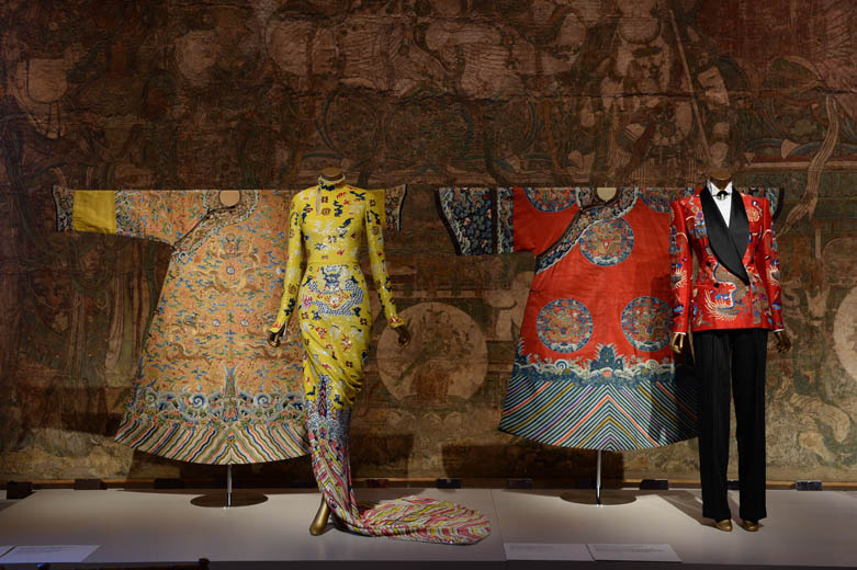 Festival robe, Yves Saint Laurent by Tom Ford evening dress, woman’s court robe, and Ralph Lauren ensemble