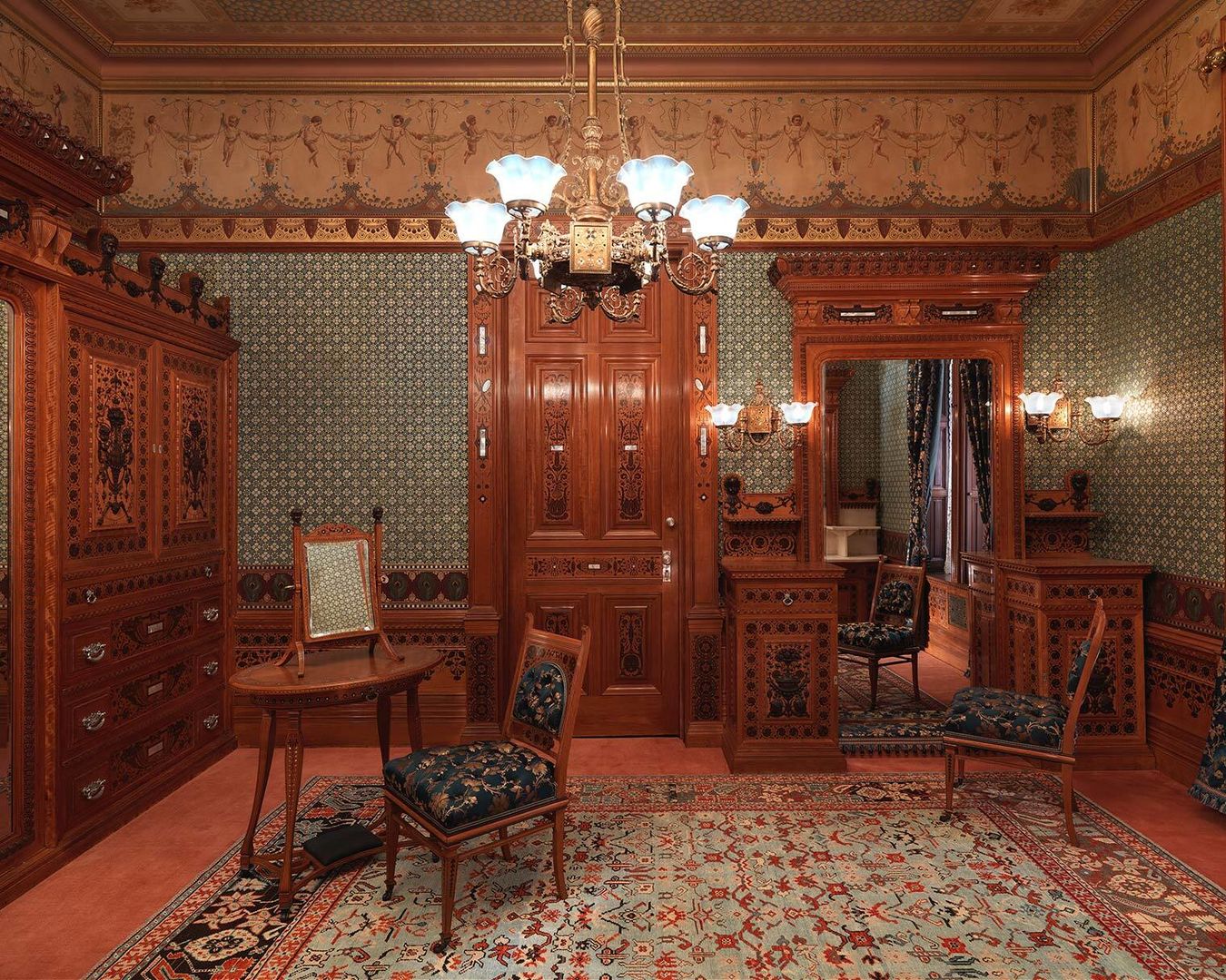 An ornate wood-paneled dressing room