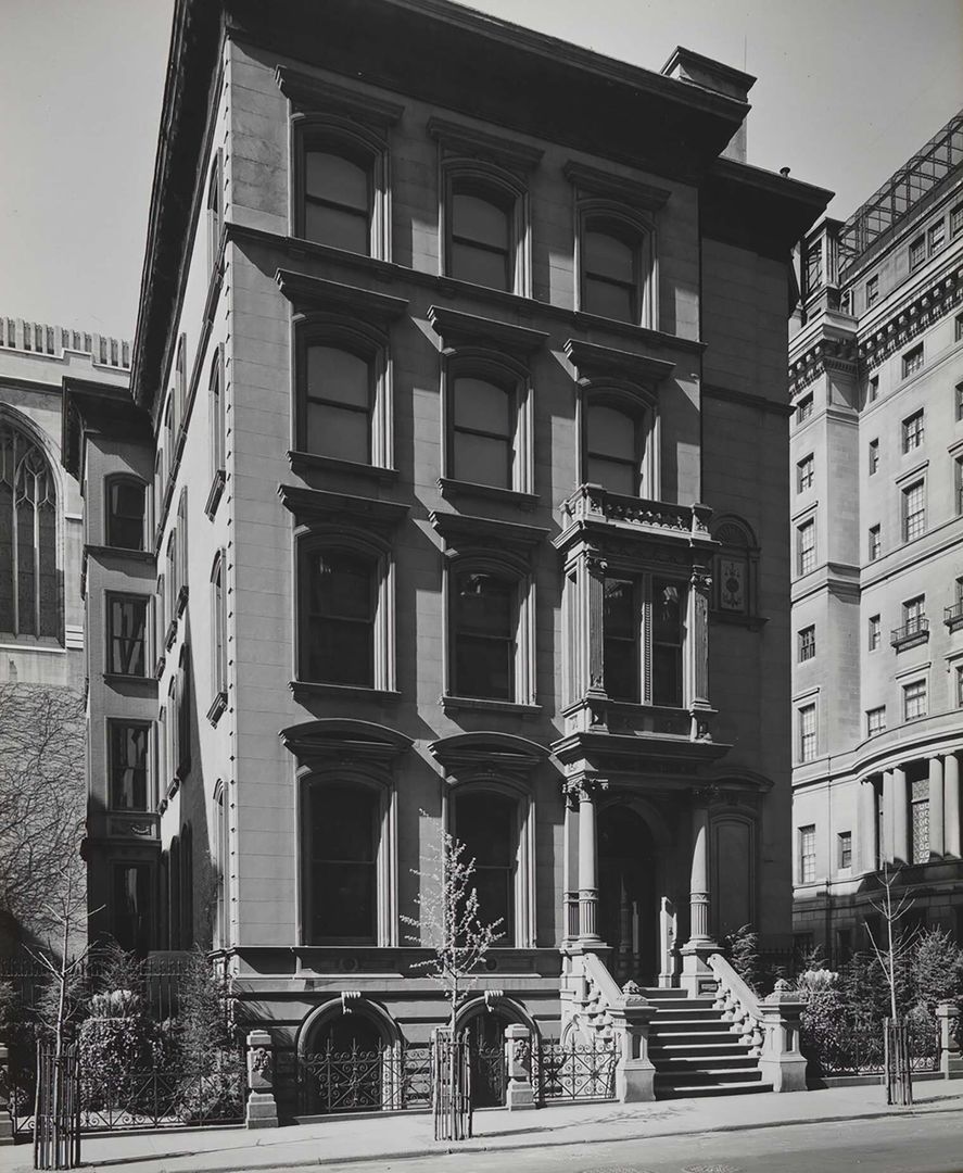 An old photo of a four-story building