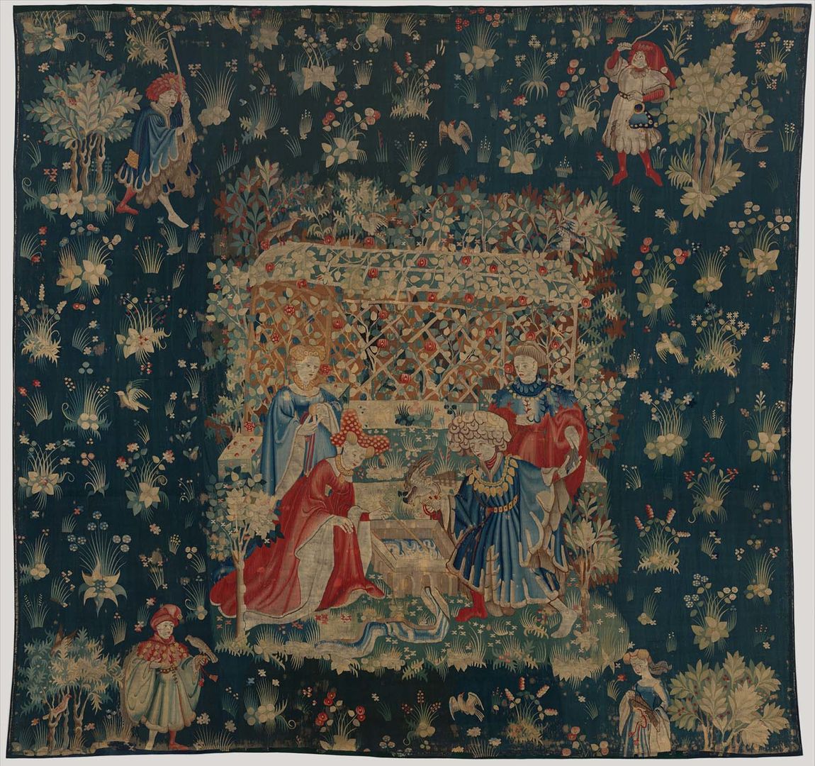 Tapestry depicting courtly figures training a falcon