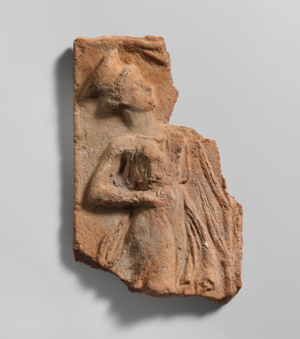 <B>Fragmentary terracotta pinax (plaque) with a dancing girl</B>, 5th century B.C., Cretan (53.5.39)