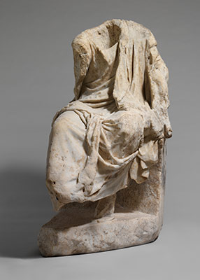 Marble statue of a draped seated man