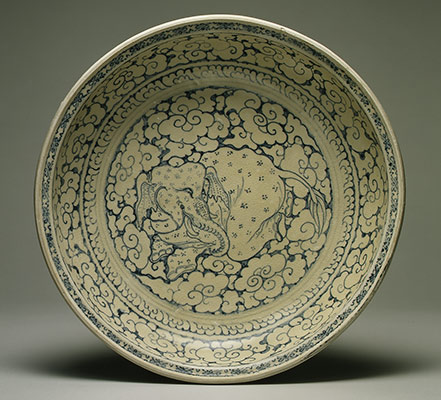 Dish with recumbent elephant surrounded by clouds