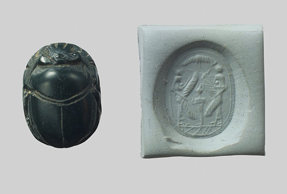 Scarab seal and modern impression: Osiris flanked by protective deities