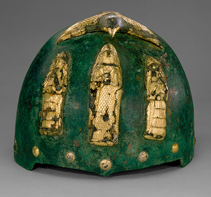 Helmet with divine figures beneath a bird with outstretched wings