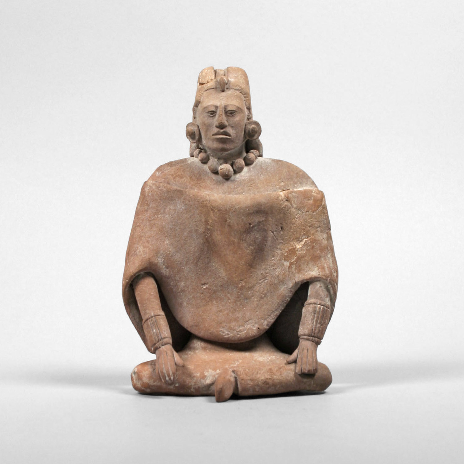 seated female nude
