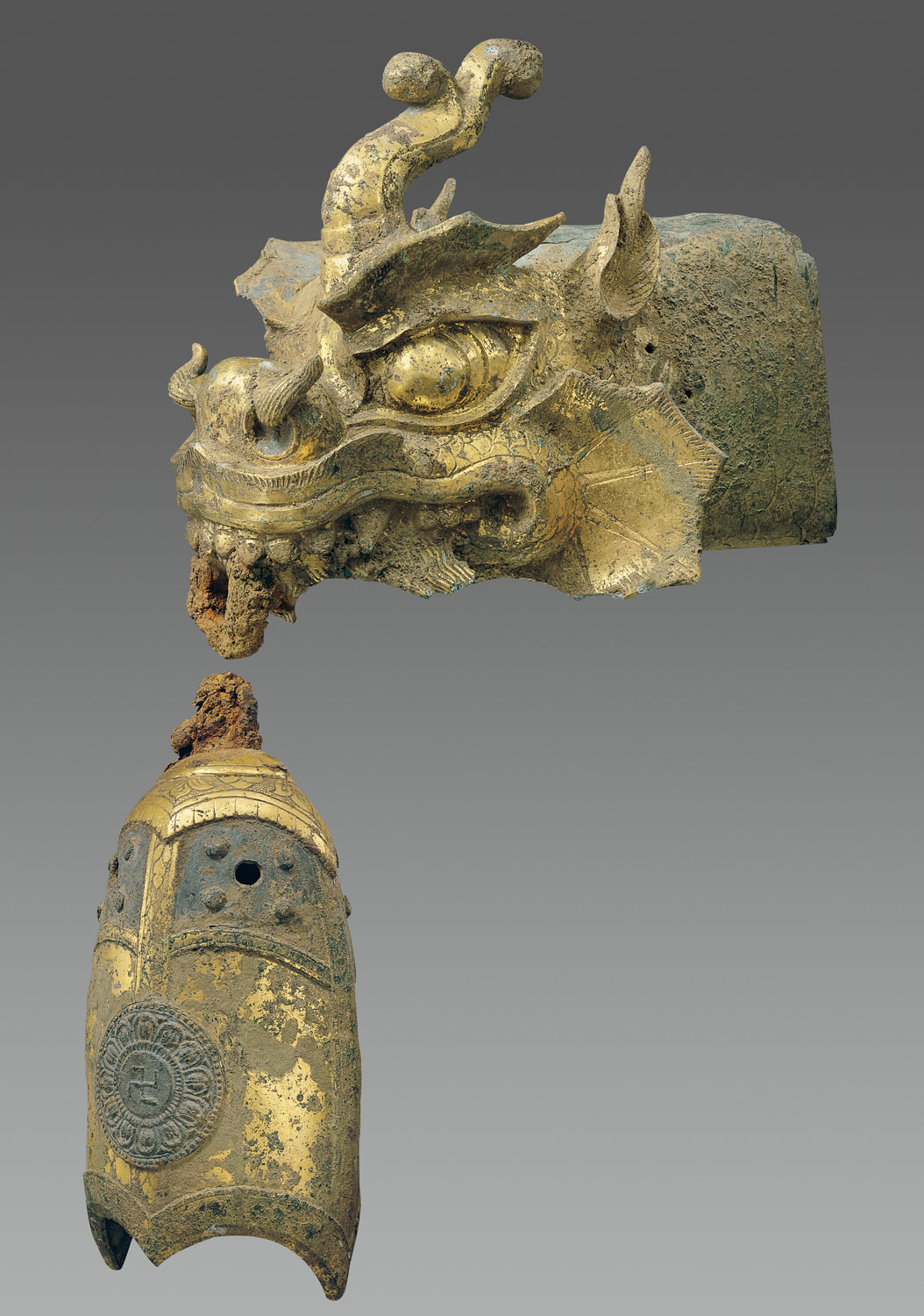 Rafter finial in the shape of a dragons head and wind chime