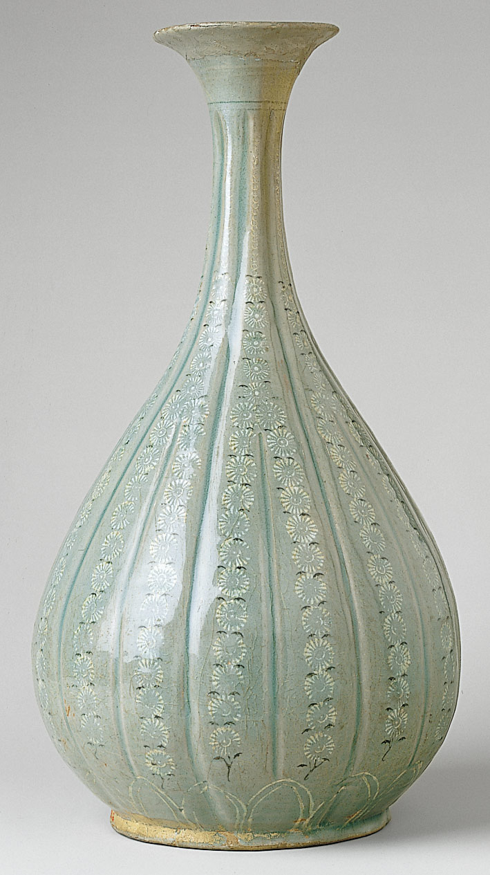 Bottle with decoration of chrysanthemums and lotus petals