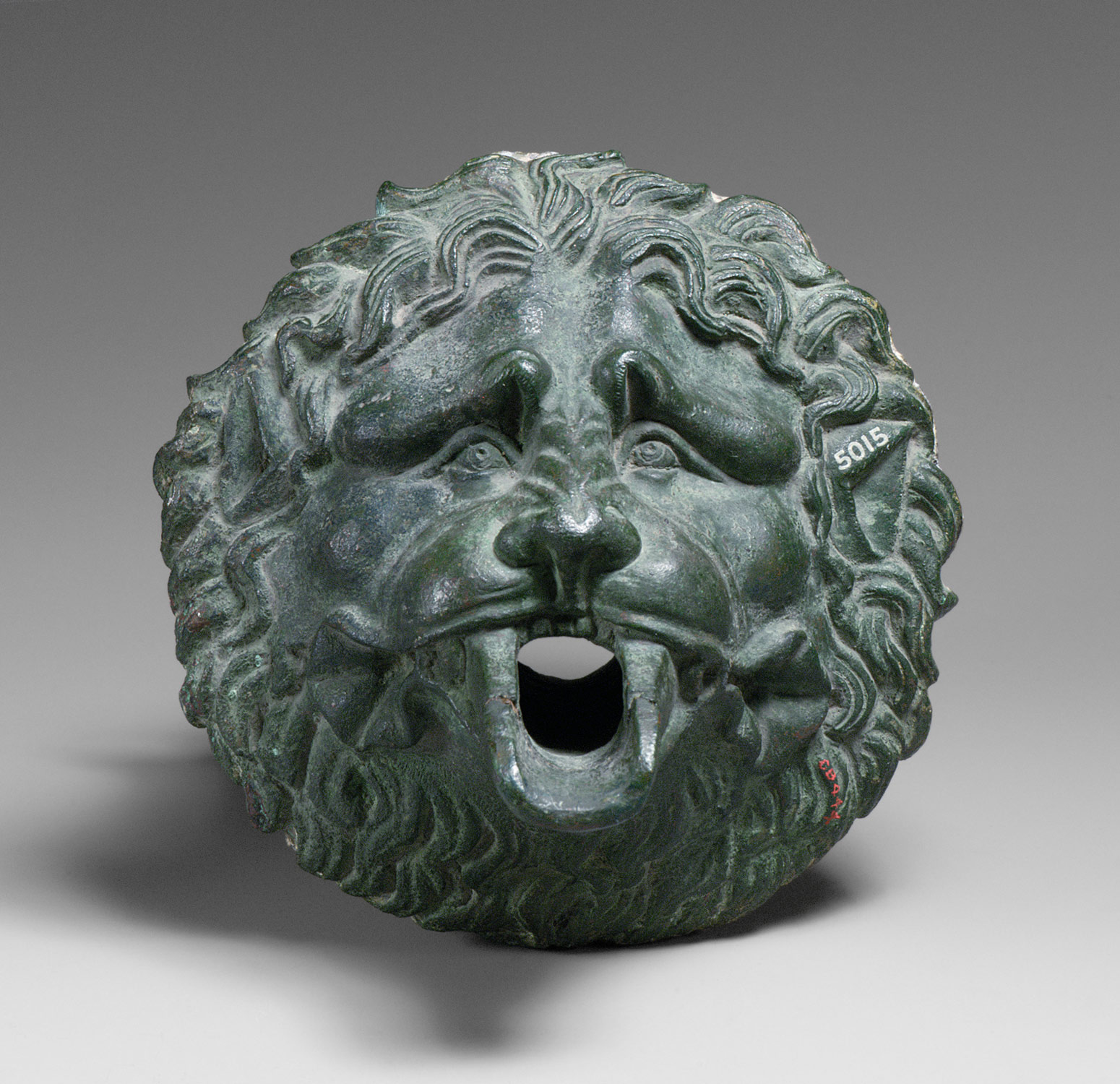 Bronze water spouts in the form of lion masks