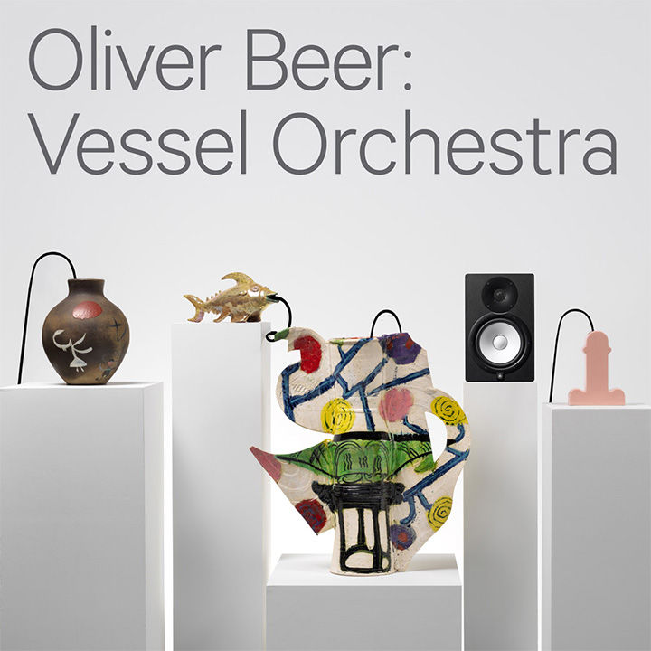 An assorted group of vessels with wires emerging from their openings and single stereo stand atop white pedestals of varying heights; the following text appears overhead: "Oliver Beer: Vessel Orchestra"
