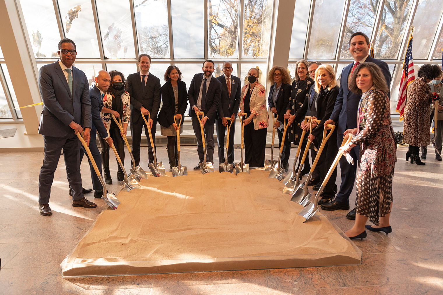 Group photograph of the groundbreaking ceremony for The Michael C. Rockefeller Wing renovation at The Met Museum