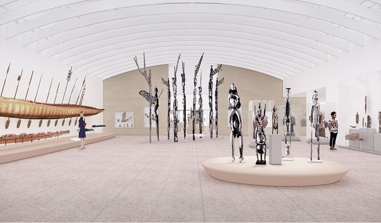 Large lit room full of standing pale and wooden obejcts on display.