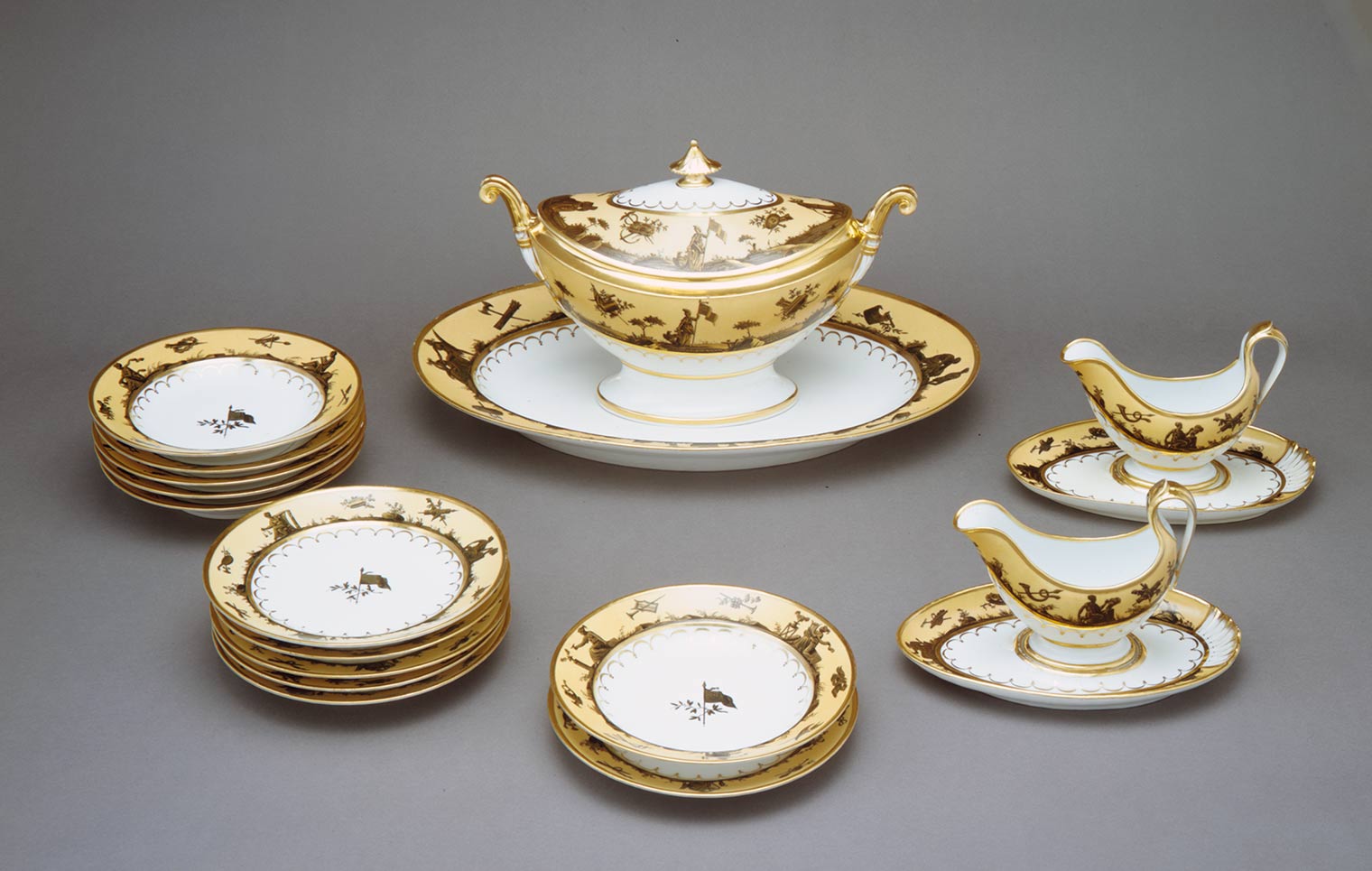 Early 19th-century porcelain dining set with gold embellishment and patriotic details