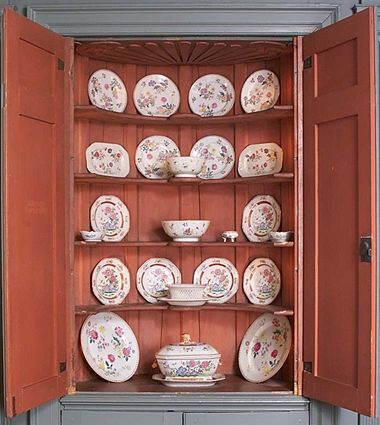 White floral china set in a cupboard from the Verplanck Room