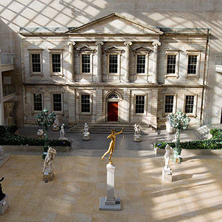 View of the bank façade in the Charles Engelhard Court at The Met