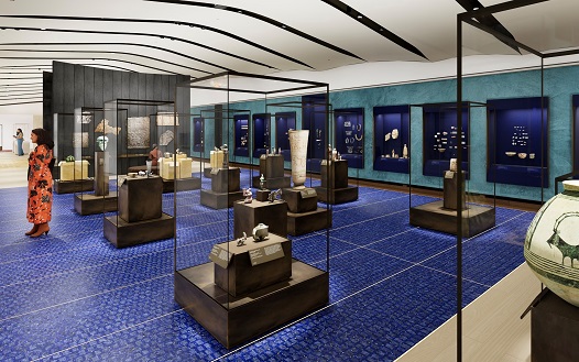 Room from an ancient Assyrian place decorated with large stone relief panels and colossal winged, human-headed animal deity sculptures