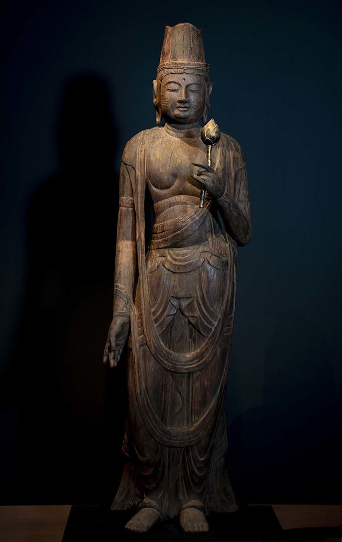 The Bodhisattva Kannon (Avalokiteshvara). Japan, Heian period (794–1185), mid-11th century. Cypress wood. H. 59 1/8 in. (150.2 cm). Purchase, Bequest of Mary Stillman Harkness, by exchange; Bequest of Henrie Jo Barth; and funds from various donors, 2021 (2021.116a, b)