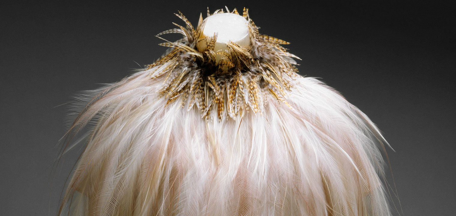 Detail view of an evening dress made of feathers