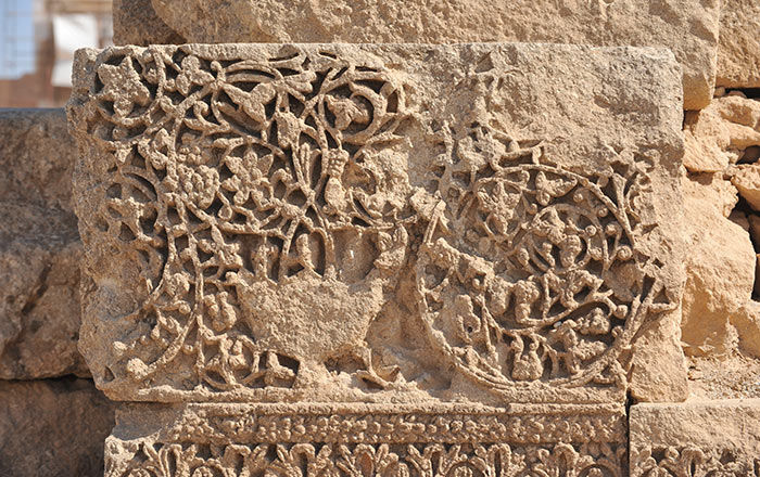Fragment Carved with Vine Scroll and a Vase