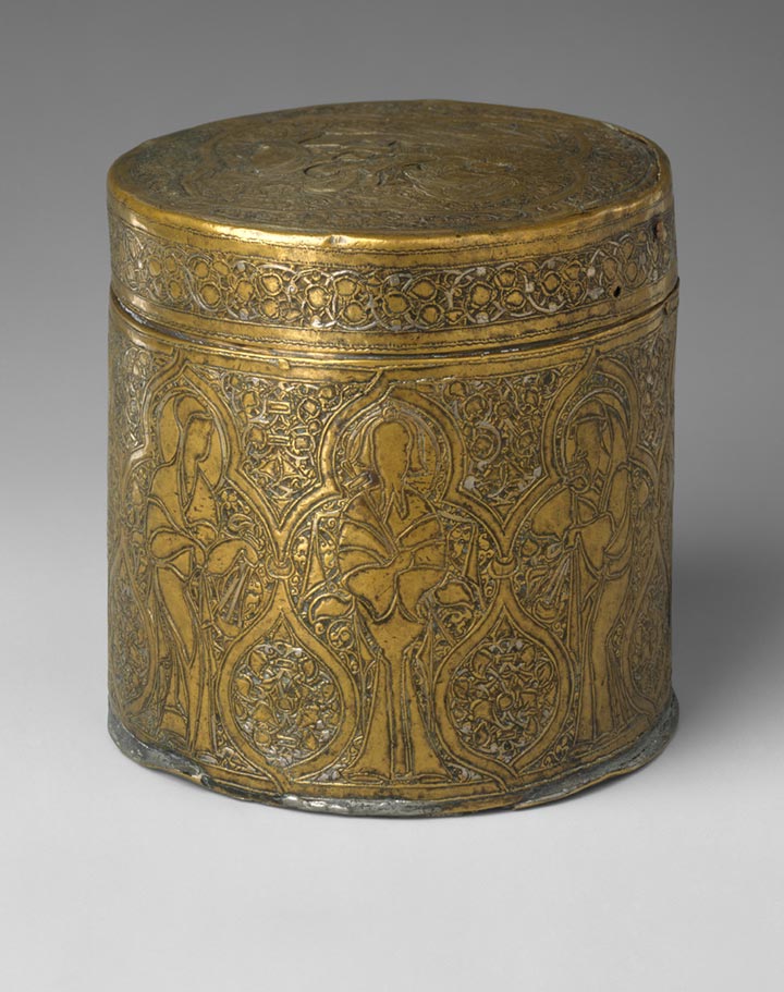Right: Pyxis depicting Christ's entry into Jerusalem, mid-13th century. Syrian, Ayyubid period (1169–1260). Islamic. Brass; hammered, chased, inlaid with silver and black compound; H. with lid 4 1/2 in. (10.5 cm), H. without lid 3 1/2 in. (8.9 cm), Diam. 4 1/16 in. (10.3 cm). The Metropolitan Museum of Art, New York, Rogers Fund, 1971 (1971.39a, b)
