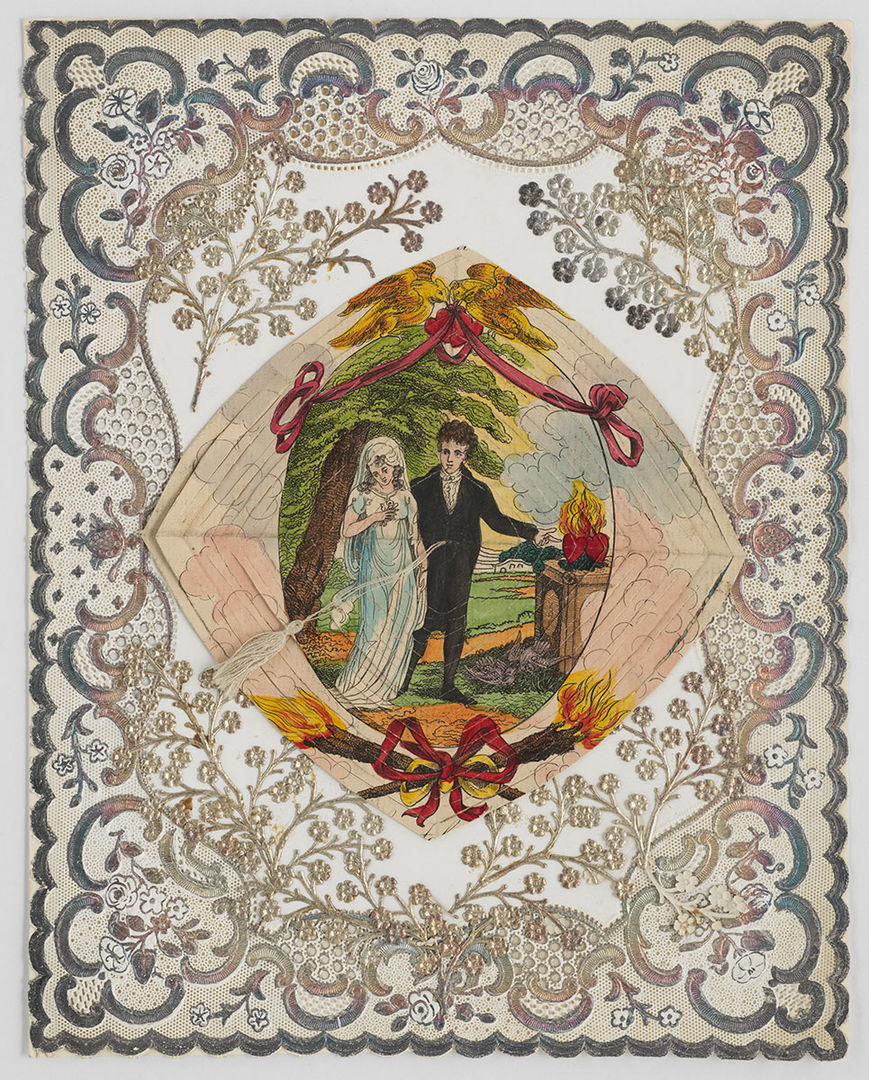 Lithograph Cobweb Valentine with Couple at an Altar of Love with watercolor mounted on silver embossed lace paper with silver Dresden leaves and silk tassle, 