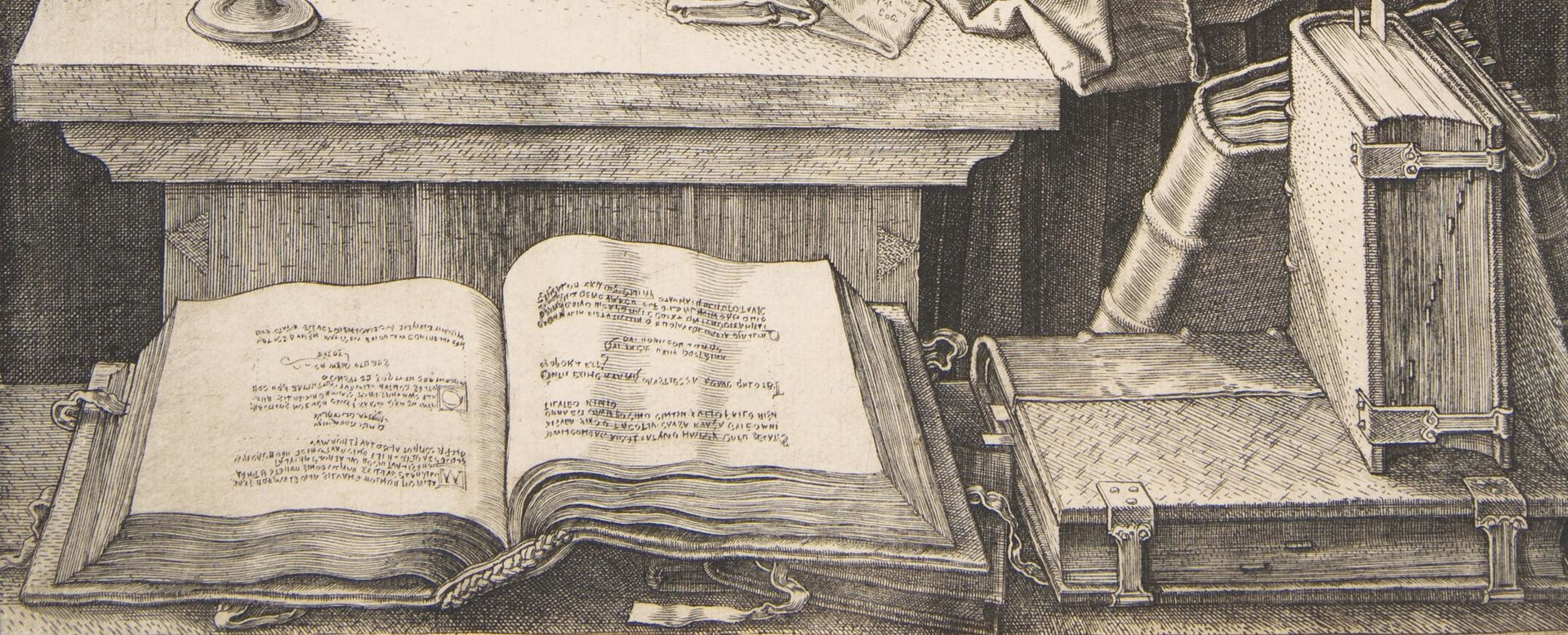 Engraving of open and closed books on a tabletop.