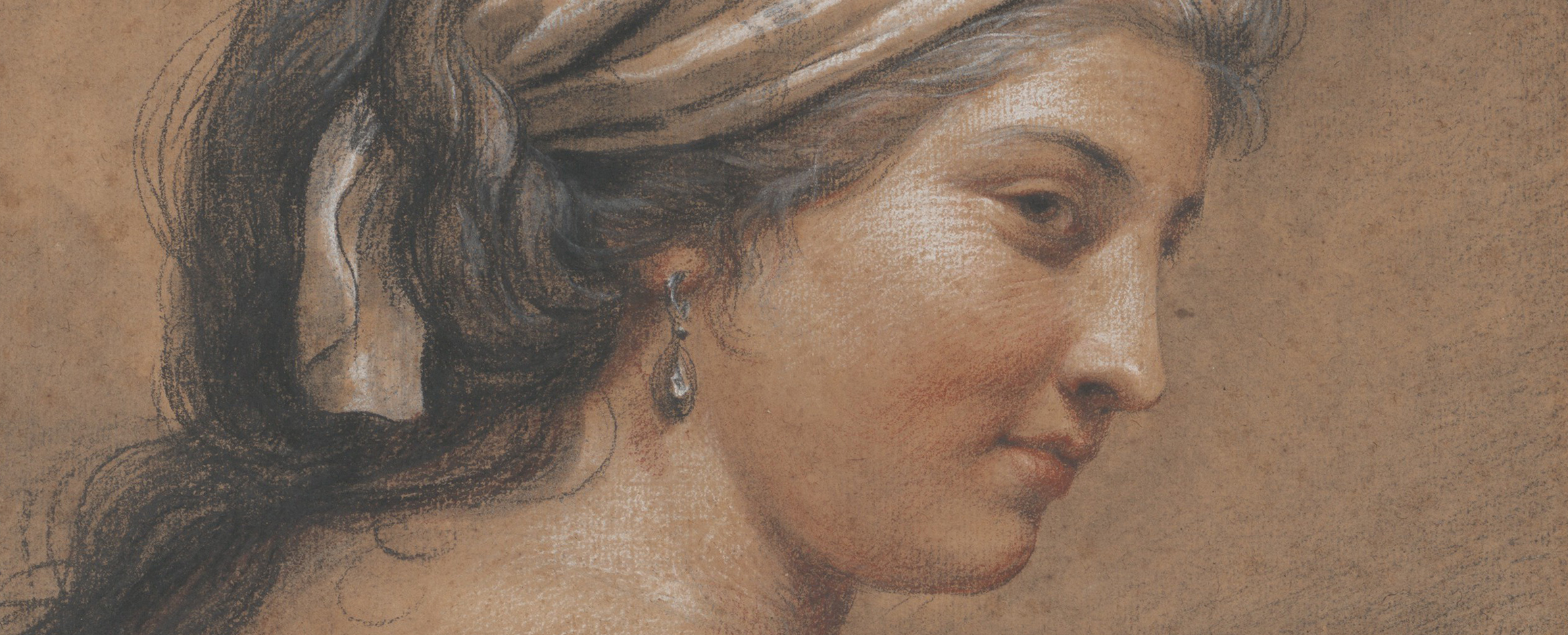 A close-up detail of a woman's head in profile, drawn in reddish chalk.
