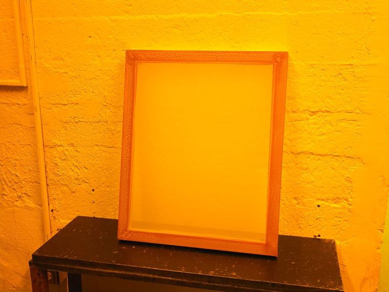 Image of a screenprinting screen in a printmaking studio
