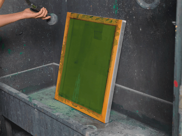 Animated image of a screenprinting screen being washed out