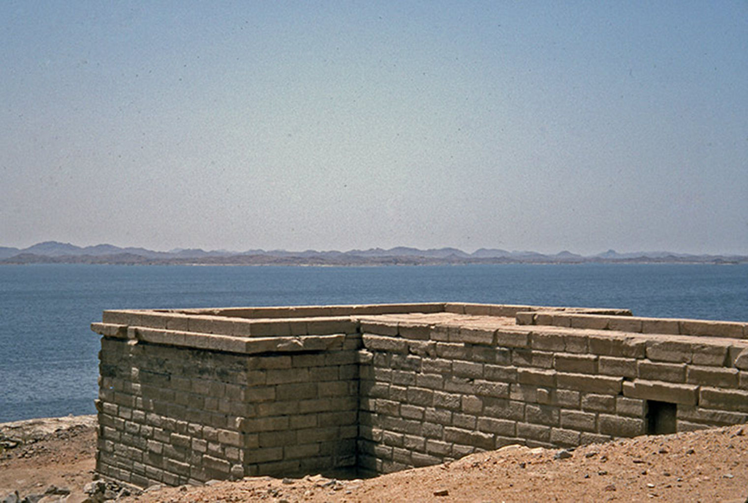 A color photograph of the terrace of the temple at Kalabsha, overlooking the Nile river.