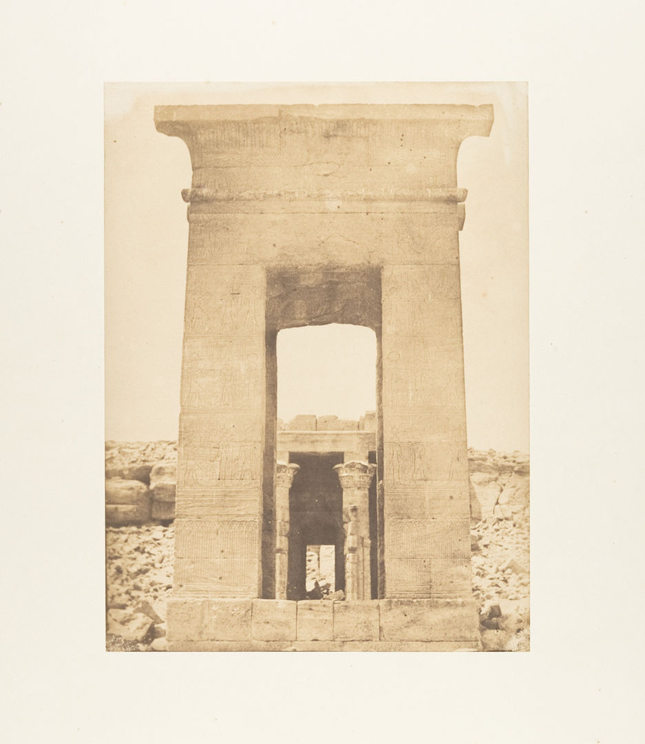 A salted paper print from a paper negative depicting the view of the propylon of the Temple of Dendur.