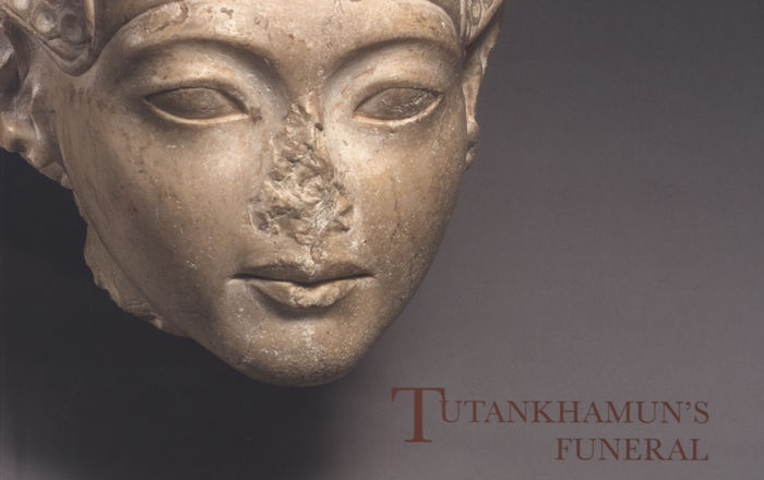 Part of a book cover, with the title, Tutankhamun's Funeral, on the lower right. On the left is the face of Tutankhamun as a young boy.