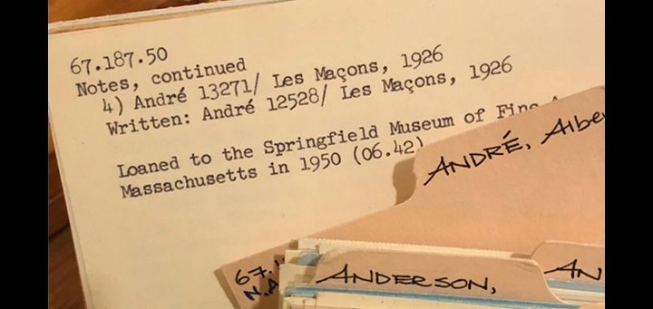 Two folders with text on the fold