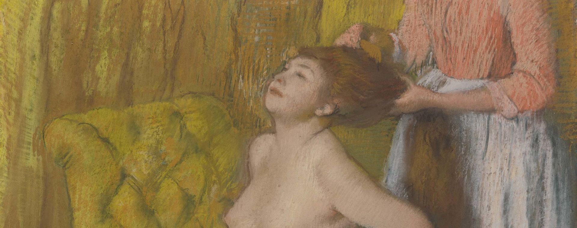 Detail of a woman having her hair combed