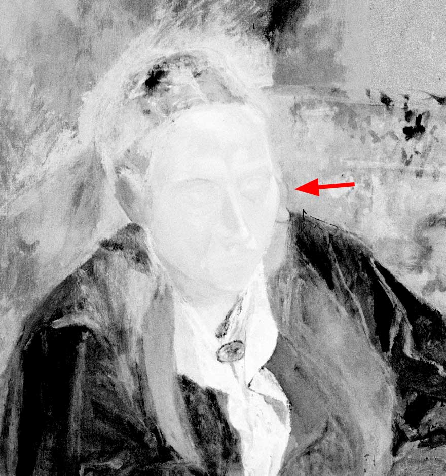 Black-and-white image of entire figure showing previous blurry stages with red arrow pointing to cheek