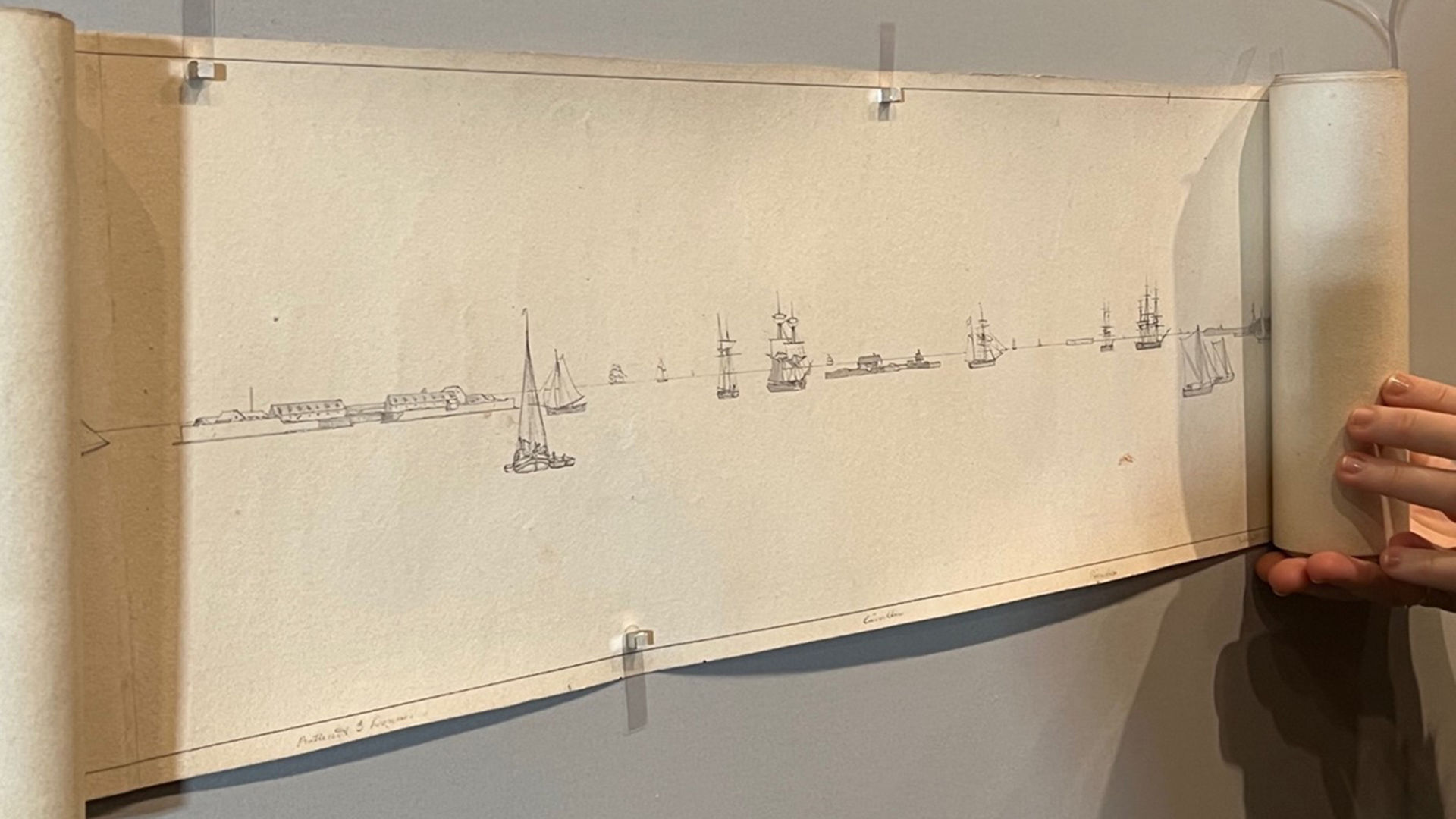 Installing the panorama by unrolling and placing magnets