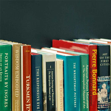 A row of colorful Art History books.