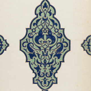 Detail of a book cover showing an ornate blue and green design