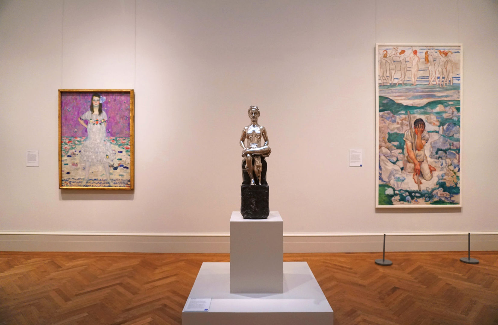 Gallery view of a silver sculpture by Max Klinger installed between two paintings by Gustav Klimt and Ferdinand Hodler