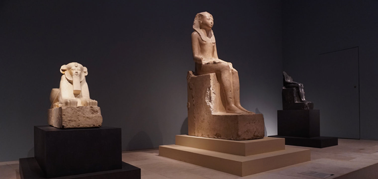 Installation view of objects depicting Hatshepsut