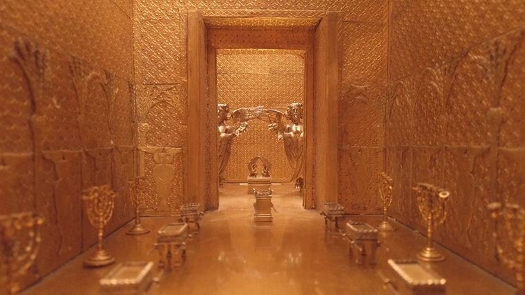 A golden hallway from an architectural model of an ancient temple