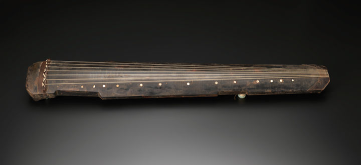 17th-century Chinese qin, or plucked zither, made of wood, silk, jade, lacquer, and mother-of-pearl