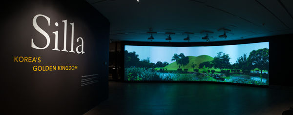 Video projection and title wall at the entrance to the exhibition