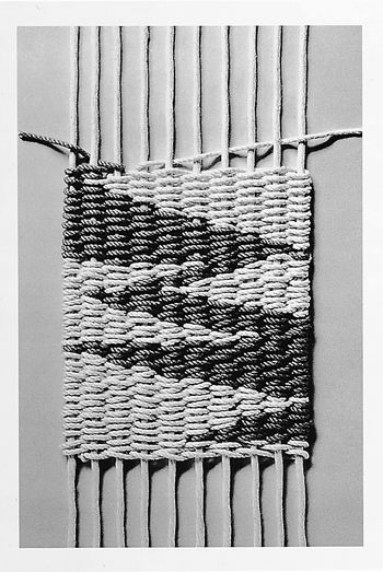 Model of weft-faced tapestry weave