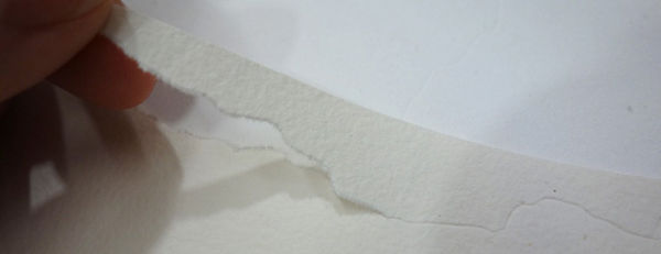 The shaped fill is removed from the soft paper