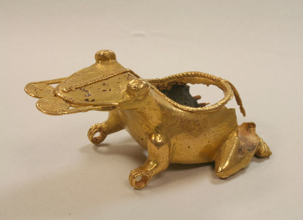 Fig. 1. Frog pendant, 5th–10th century. Venado Beach, Panama. Gold (cast), black core; H. 2 3/4 x W. 3 3/4 x D. 1 7/8 in. (7 x 9.5 x 4.8 cm). The Metropolitan Museum of Art, New York, The Michael C. Rockefeller Memorial Collection, Bequest of Nelson A. Rockefeller, 1979 (1979.206.1350)