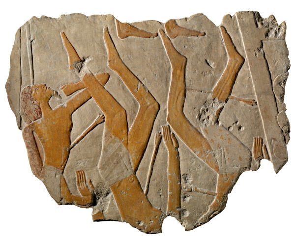 Fig. 1. Relief of foreign defenders falling from a fortress. Middle Kingdom, Dynasty 11, reign of Nebhepetre Mentuhotep II (ca. 2030–2000 B.C.). Thebes, Deir el-Bahri, temple of Nebhepetre Mentuhotep II. Painted limestone; 23 5/8 x 26 x 5 1/8 in., 209.4 lb. (60 x 66 x 13 cm, 95 kg). The Trustees of the British Museum, London (AES 732)