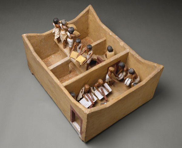 Model of a Granary with Scribes. Middle Kingdom, Dynasty 12, early reign of Amenemhat I (ca. 1981–1975 B.C.). Wood, plaster, paint, linen, grain; L. 74.9 (29 1/2 in.), W. 56 cm (22 1/16 in.), H. 36.5 (14 3/8 in.); average height of figures: 20 cm (7 7/8 in.). The Metropolitan Museum of Art, New York, Rogers Fund and Edward S. Harkness Gift, 1920 (20.3.11)